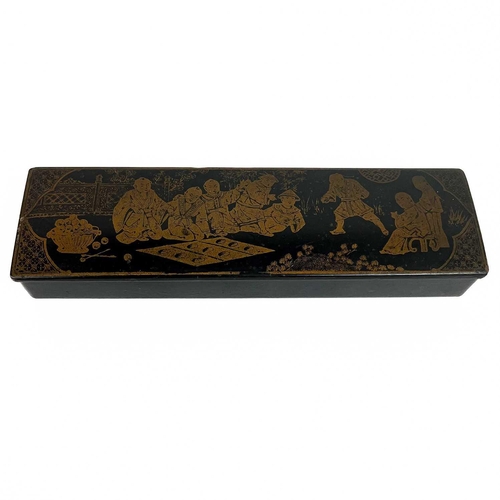 1119 - A Japanese black lacquer rectangular box, circa 1900. The cover with three gilt decorated fish, heig... 