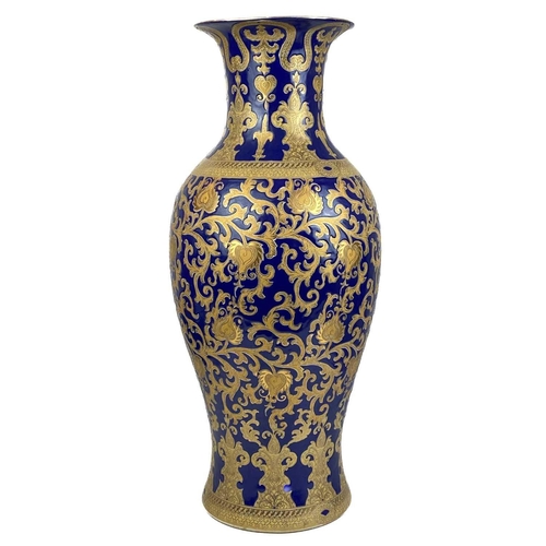 1480 - A large pair of contemporary Chinese porcelain vases. Each with a blue ground and gilt foliate decor... 