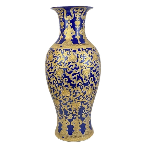 1480 - A large pair of contemporary Chinese porcelain vases. Each with a blue ground and gilt foliate decor... 