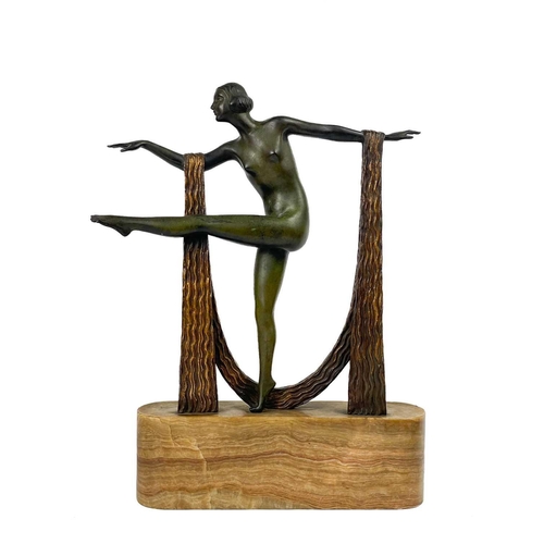 1 - An Art Deco bronze of a female dancer on an onyx base. Modelled dancing with a gilt bronze scarf, he... 