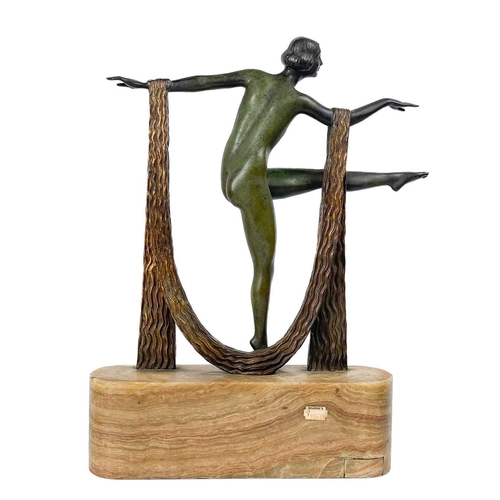 1 - An Art Deco bronze of a female dancer on an onyx base. Modelled dancing with a gilt bronze scarf, he... 