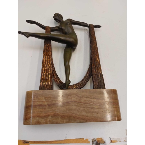 1 - An Art Deco bronze of a female dancer on an onyx base. Modelled dancing with a gilt bronze scarf, he... 