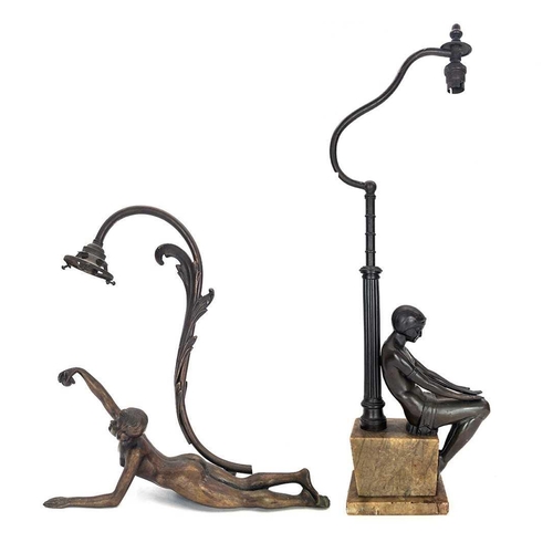 10 - An Art Deco bronze figural table lamp. Modelled as a prone Eve with the apple, stamped F R 696 to th... 