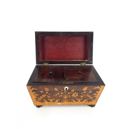 115 - A Victorian satinwood and rosewood inlaid tea caddy. Of sarcophagus shape, with twin lidded compartm... 