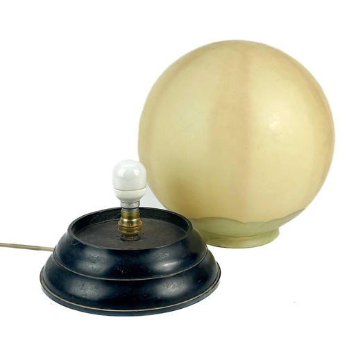 121 - An Art Deco globe glass table lamp. On turned wood base, diameter 30cm.