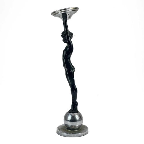 123 - An Art Deco painted cast metal figural stand, possibly by Frankart. Modelled as a dancer holding a c... 