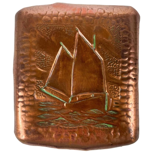 125 - An Arts and Crafts square copper pin tray by Herbert Dyer. Repousse decorated with a boat at sea, st... 