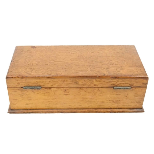 128 - An early 20th century souvenir oak box. The interior of the lid inscribed and decorated The War Fran... 