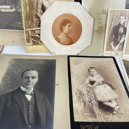 142 - A collection of Carte de Visite and Cabinet Cards. Together with larger portraits.