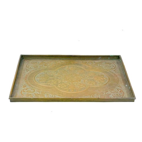 153 - A Keswick School of Industrial Arts rectangular brass tray. With typical floral and foliate repousse... 