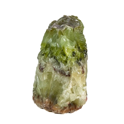 154 - A large calcite crystal cluster. With transparant tones ranging from yellow-green to darker greens, ... 