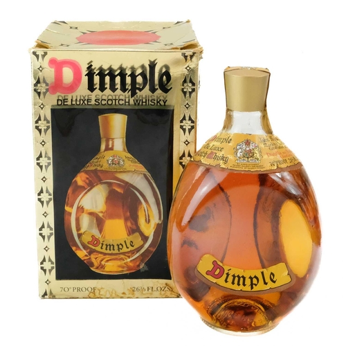 16 - A bottle of Dimple De Luxe Scotch Whisky. 70% Proof 26 2/3 Fl.Ozs in the original box.