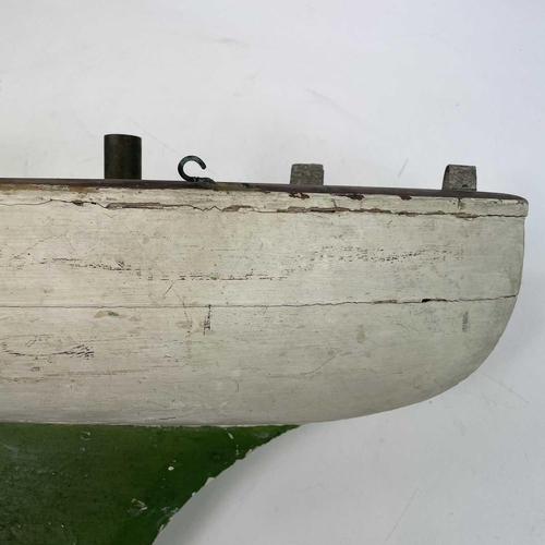 166 - A painted wood pond yacht hull, 19th century. Height 25cm, width 65cm, depth 18cm.