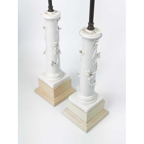 167 - A pair of Continental porcelain and brass column table lamps. French or Italian, early 20th century,... 