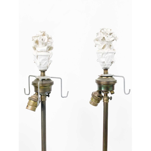 167 - A pair of Continental porcelain and brass column table lamps. French or Italian, early 20th century,... 