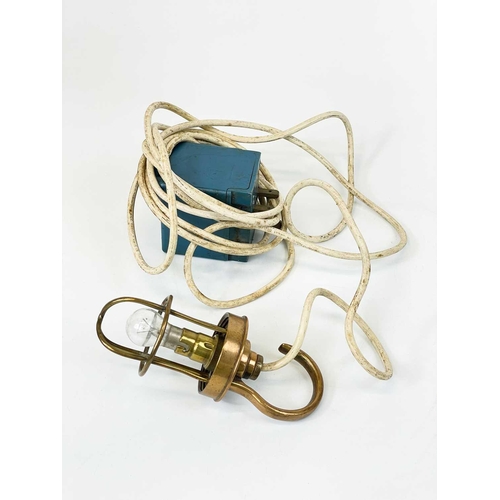 17 - A brass cage engine inspection lamp by B M A C Ltd. Stamped A.P 6662, length 16cm, together with a b... 