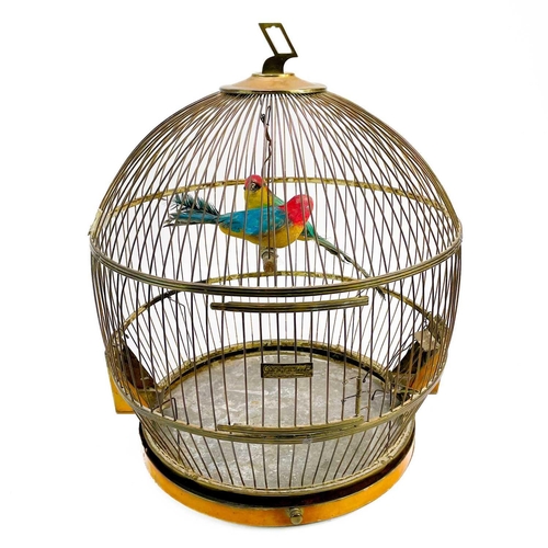 18 - A brass hanging wire birdcage by Genykage. Of ovoid form, height 43cm.