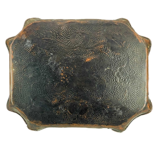 182 - An Arts and Crafts copper tray probably Eustace of Hayle. With repousse and chased decoration of pom... 