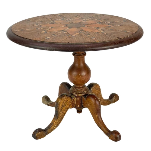 185 - An early 20th century miniature tilt top specimen parquetry table. With geometric design circular to... 