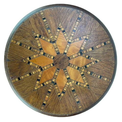 185 - An early 20th century miniature tilt top specimen parquetry table. With geometric design circular to... 