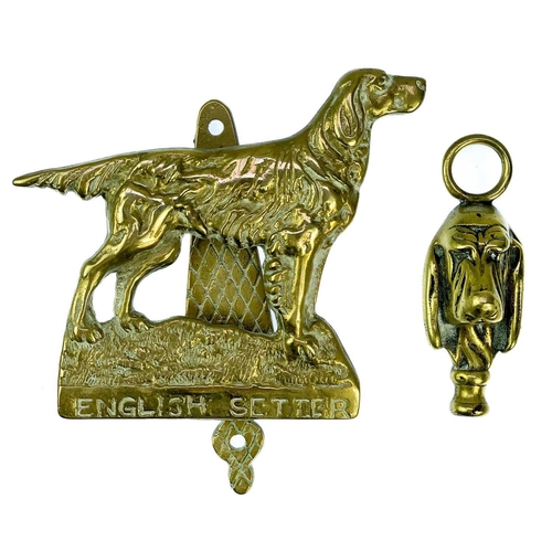 191 - A collection of twenty-eight brass souvenir novelty door knockers. (28).