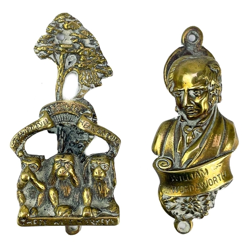 191 - A collection of twenty-eight brass souvenir novelty door knockers. (28).