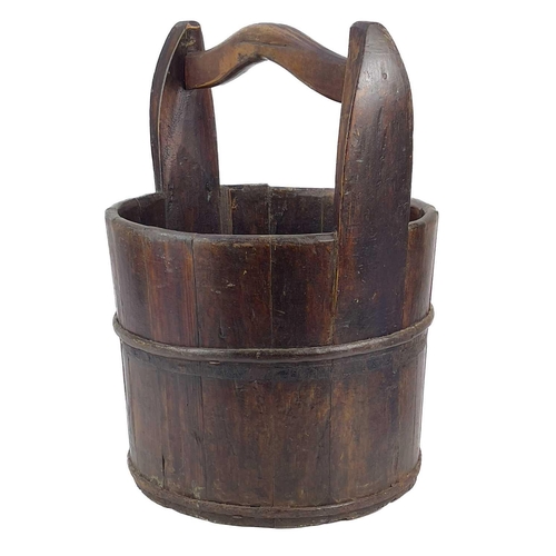 203 - A coopered well bucket. With iron banding, diameter 35.5cm.