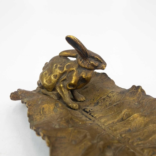 209 - A late 19th century gilt bronze pen tray. Modelled as a hare on Romaine lettuce leaf, length 30cm.