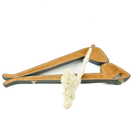 217 - A Turkish Meerschaum large pipe. 20th century, carved with the head of a turbanned gentleman, length... 