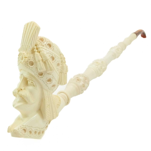 217 - A Turkish Meerschaum large pipe. 20th century, carved with the head of a turbanned gentleman, length... 