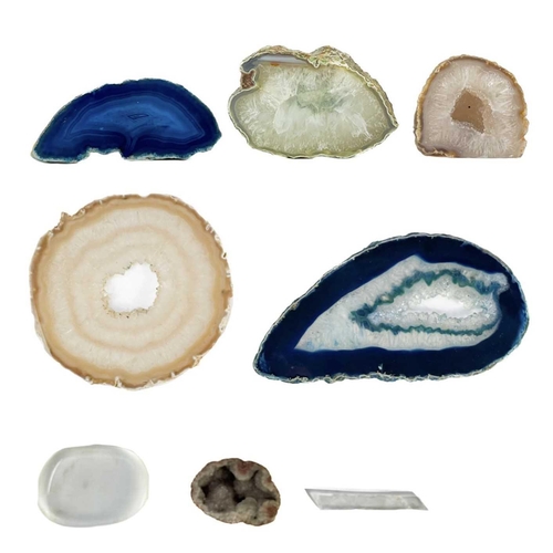 23 - A collection of cut and polished agate slices. The largest is 16cm x 8.5cm x 0.5cm; Together with a ... 