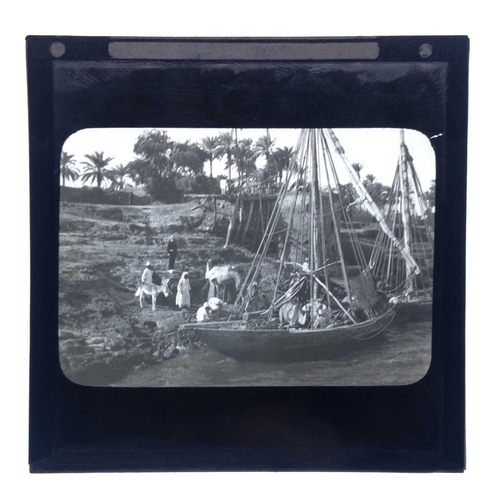 235 - A box of approximately 80 lantern slides, mainly Egyptian Nile, Archaeology, etc. Some with ink insc... 