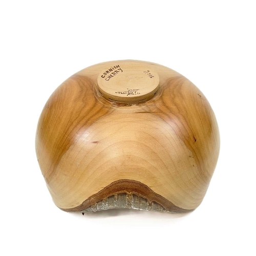 239 - A cherry wood turned bowl with live edge. Signed T E Jones Cornish Cherry 2016, diameter 22cm.