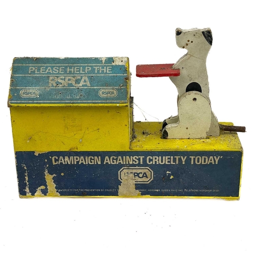 240 - A composition freestanding RSPCA charity collection box. Moulded as a spaniel and two pups, on a gre... 