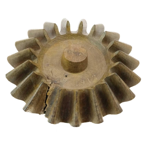 244 - A hardwood cog pattern, stamped Levant March 1912. Probably Holman's, diameter 17cm.