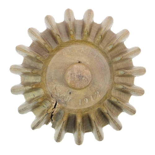 244 - A hardwood cog pattern, stamped Levant March 1912. Probably Holman's, diameter 17cm.