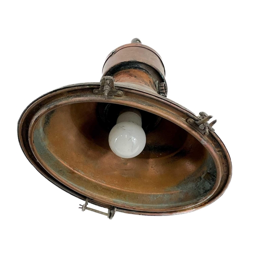 249 - A pair of copper industrial ceiling lamp pendants. Height 50cm.