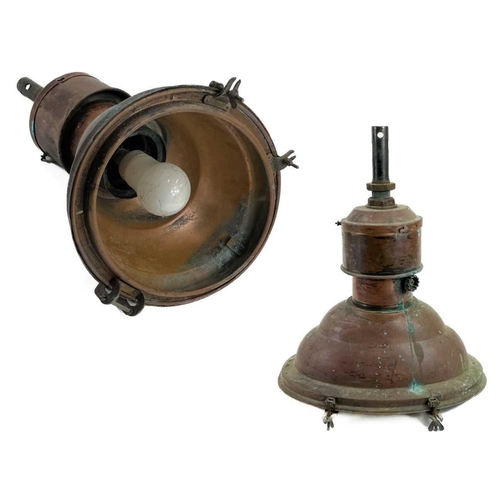 249 - A pair of copper industrial ceiling lamp pendants. Height 50cm.