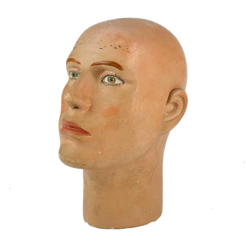 267 - A Plaster of Paris Mannequin head. Circa 1930, probably French, with painted features, height 28.5cm... 