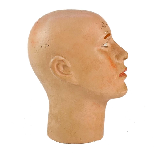 267 - A Plaster of Paris Mannequin head. Circa 1930, probably French, with painted features, height 28.5cm... 