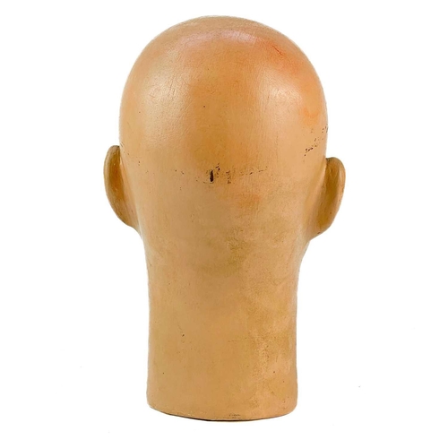 267 - A Plaster of Paris Mannequin head. Circa 1930, probably French, with painted features, height 28.5cm... 