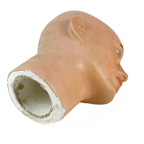 267 - A Plaster of Paris Mannequin head. Circa 1930, probably French, with painted features, height 28.5cm... 