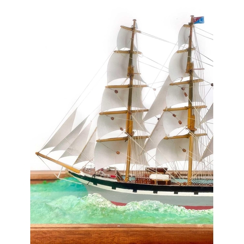 268 - A scratch built model of a Victorian Clipper ship. Under a glazed case, overall height 45cm width 68... 