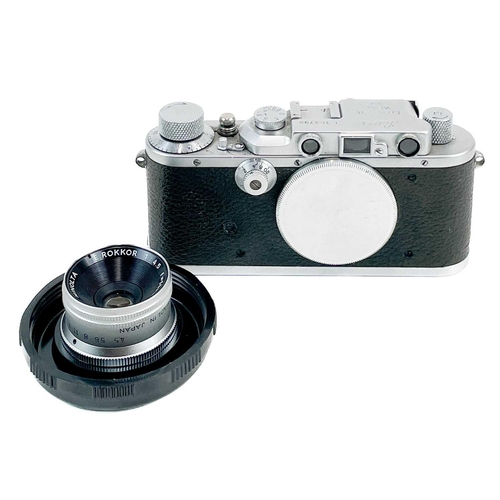 277 - A Leica IIIa Rangefinder 1935 camera body in chrome. No. 163796, together with a Leitz Nooky close u... 