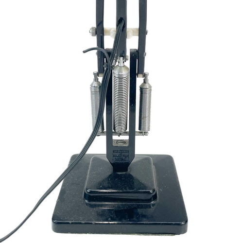 28 - A Herbert Terry anglepoise lamp. With black painted finish, height 55cm. The springs and adjustabili... 