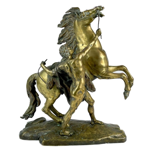 285 - A substantial pair of brass Marly horses, After Coustou. Each with stamped signature on the rockwork... 