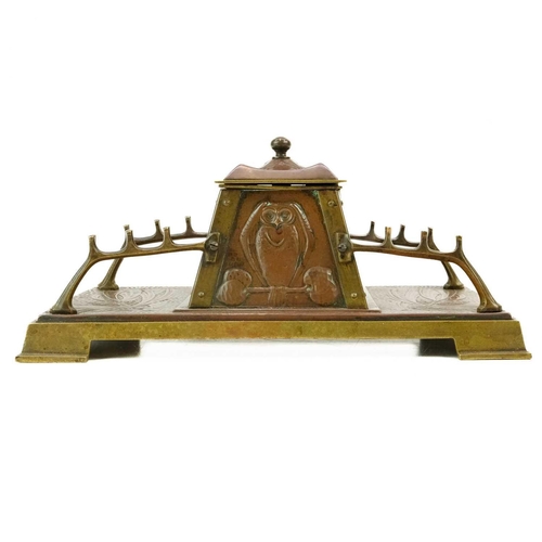 295 - A Jugendstil inspired brass and copper inkwell or Standish. Probably German circa 1900, the tapered ... 