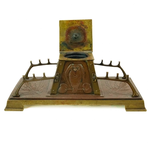 295 - A Jugendstil inspired brass and copper inkwell or Standish. Probably German circa 1900, the tapered ... 