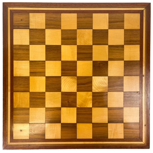 30 - A boxwood and ebony chess set. In a mahogany box, another chess set, and an inlaid chess board.