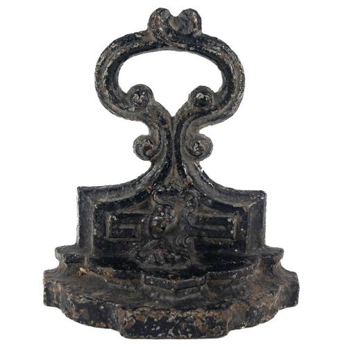 32 - A cast iron doorstop. Height 19.5cm.